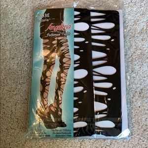 Women’s patterned tights. One size. Brand new.